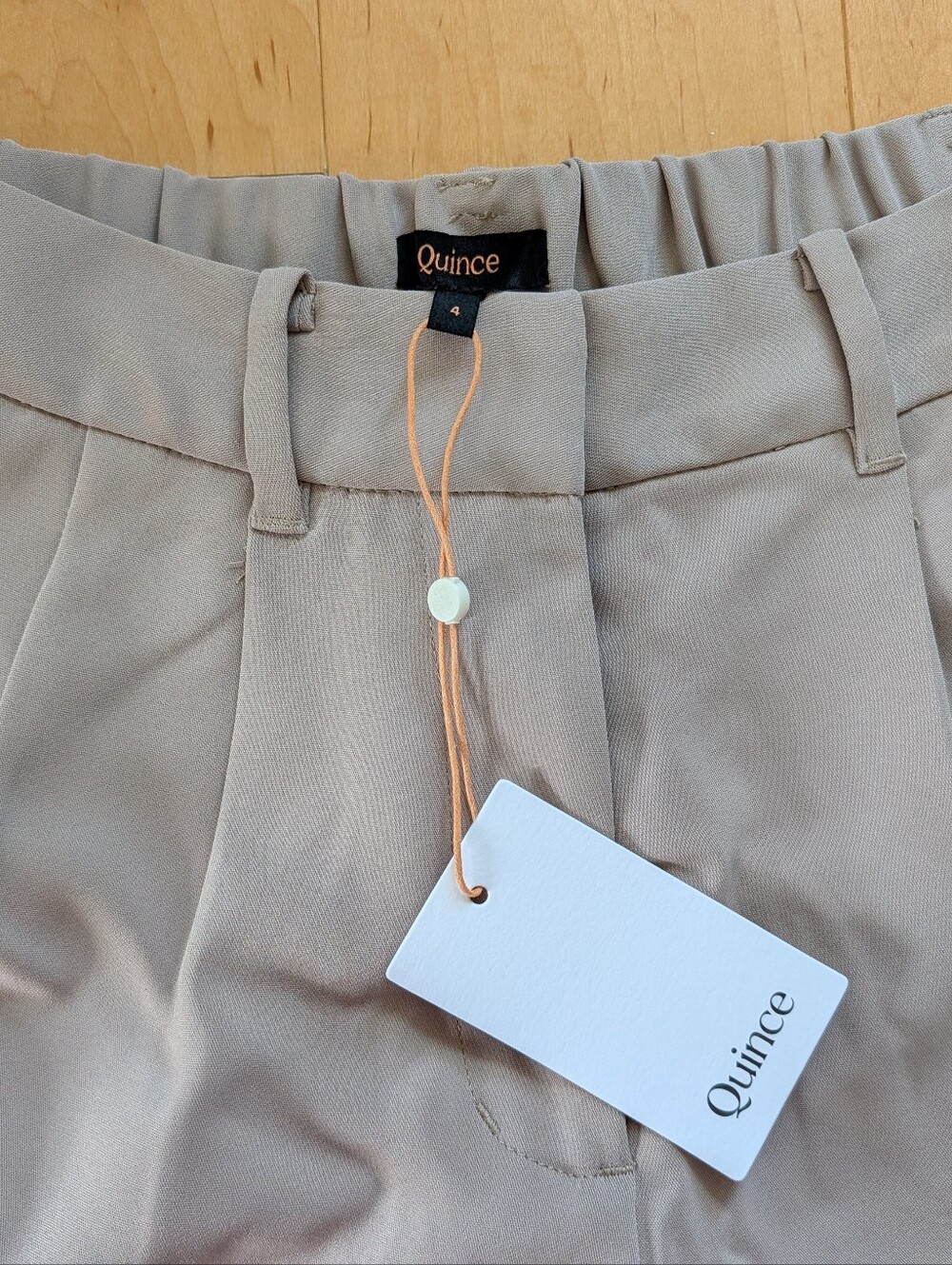 Quince Wide-Leg Pleated Trousers in Beige - Picture 4 of 9
